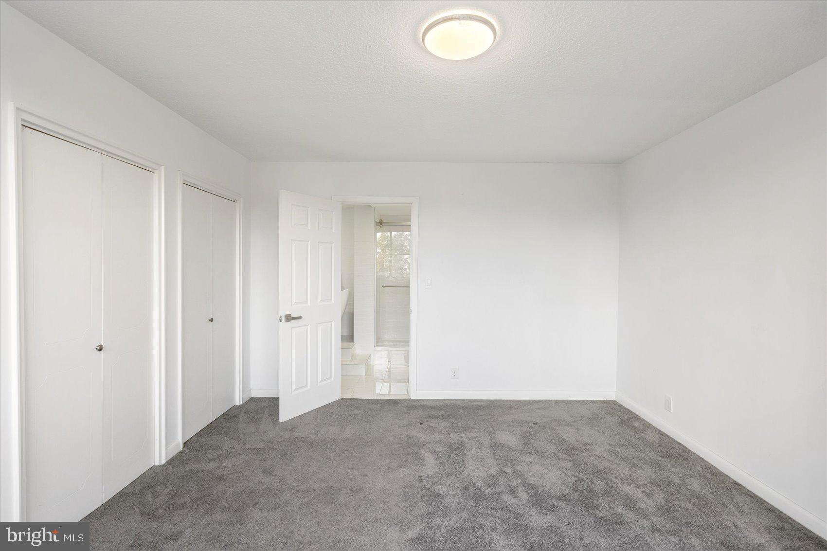 7111 Park Heights Avenue, Unit 305 Baltimore, MD 21215 - Photo 16 of 33 a view of an empty room