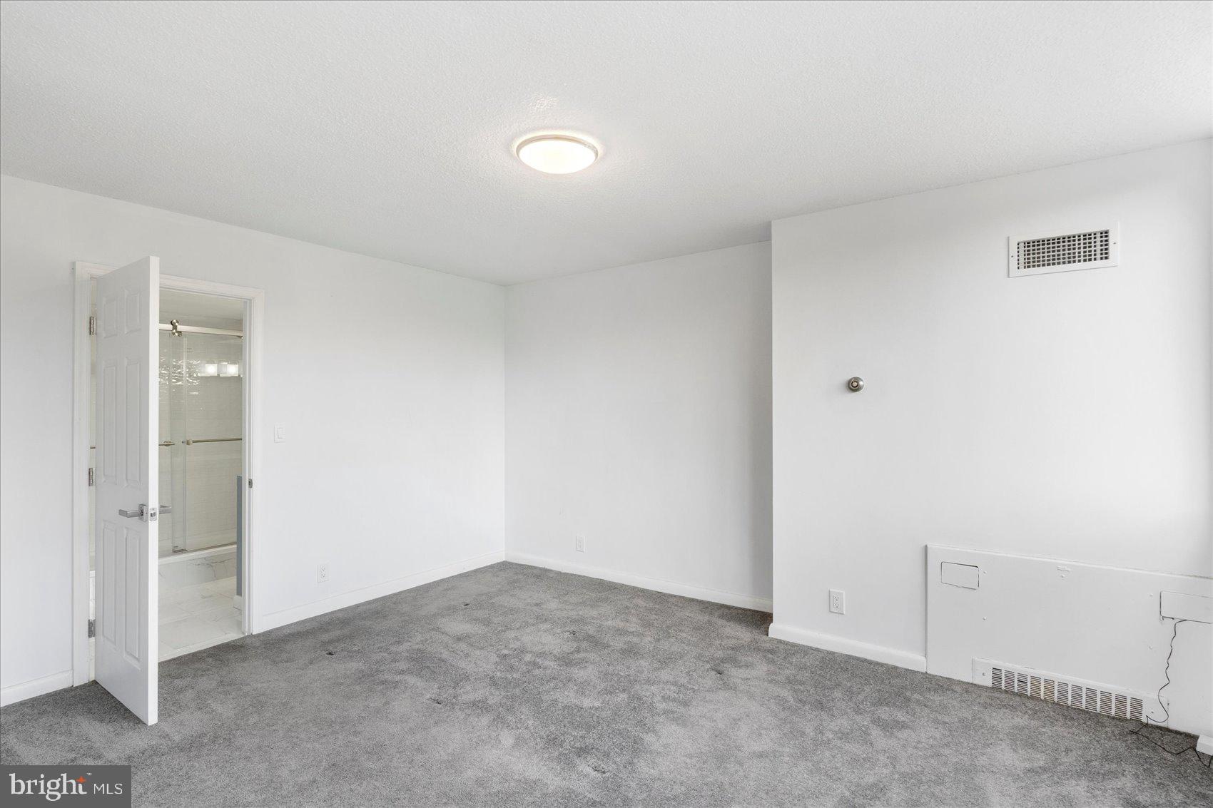 7111 Park Heights Avenue, Unit 305 Baltimore, MD 21215 - Photo 17 of 33 a view of an empty room