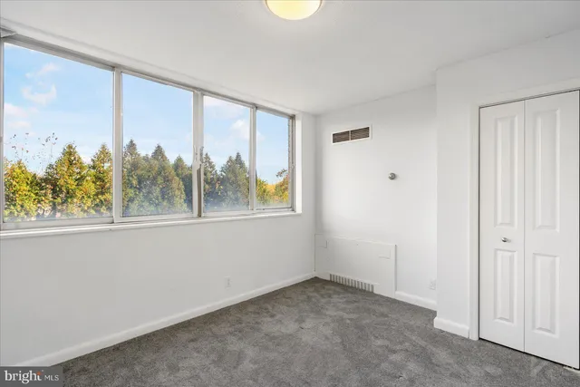 a view of an empty room with window