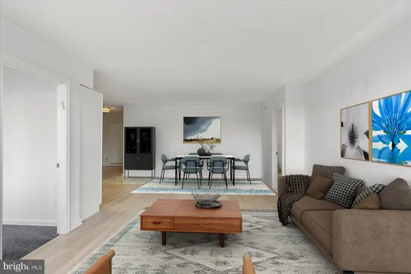 a view of an empty room and wooden floor