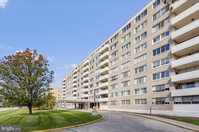 a view of parking with cars parked