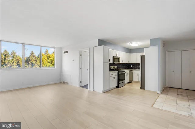 an empty room with windows