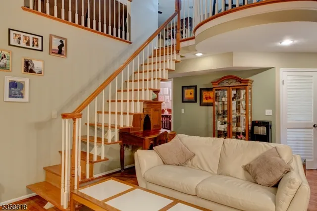 a living room with furniture or stairs and a couch