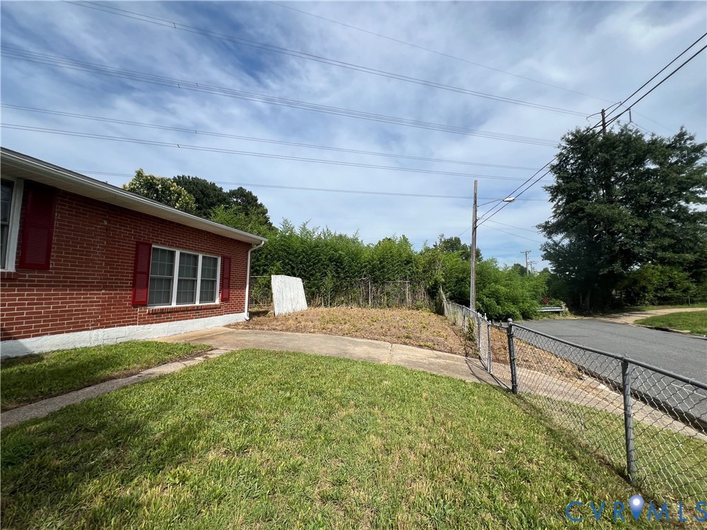 1403 Algona Road Chesapeake, VA 23324 - Photo 3 of 39 Brick exterior with white trim and red window shut
