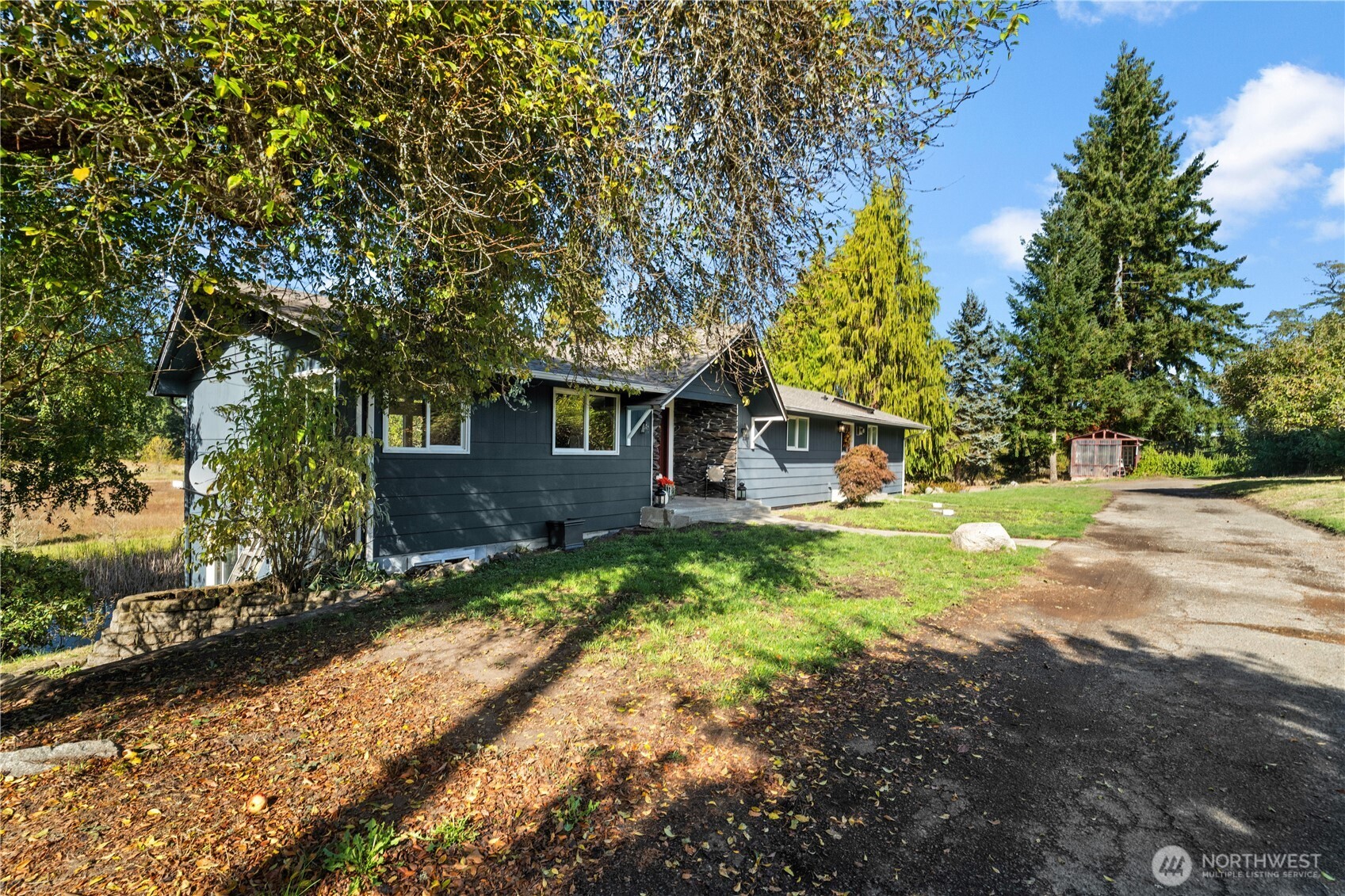 1305 336th Street South Roy, WA 98580 - Photo 33 of 40 a front view of a house with a yard