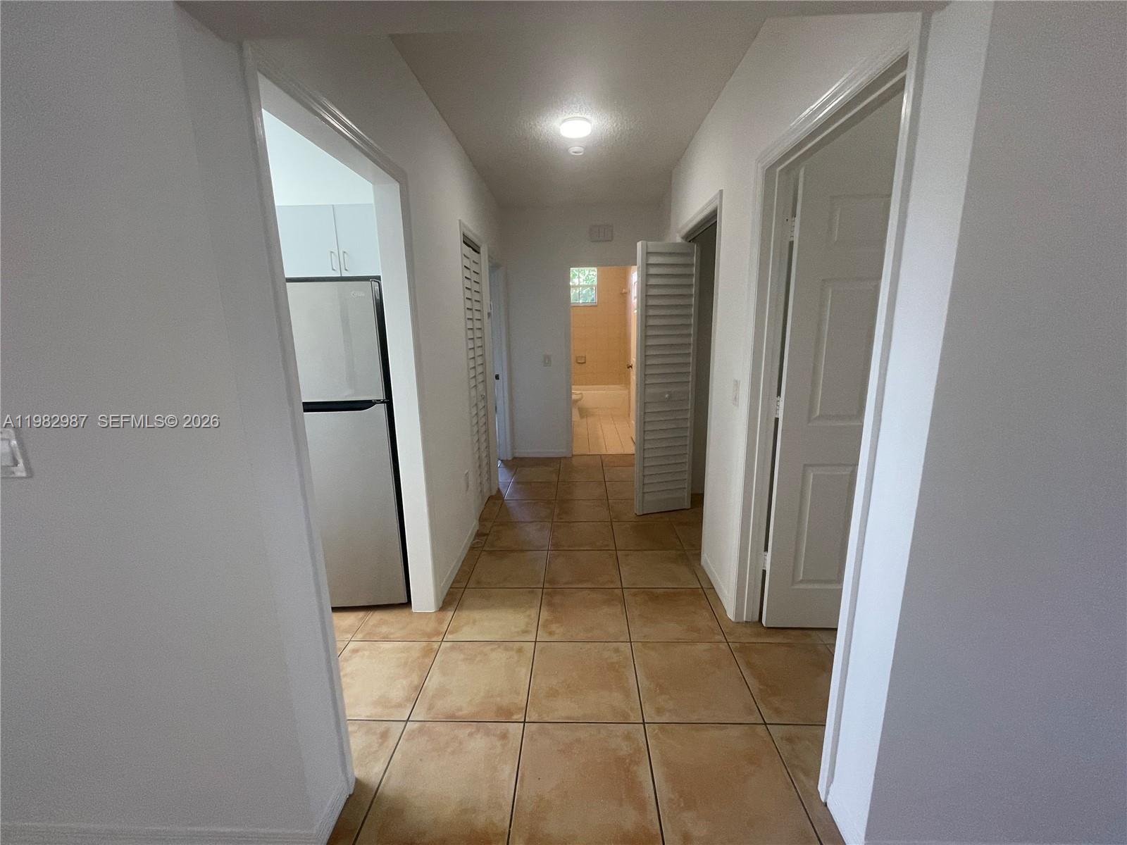 3421 Southwest 25th Street, Unit 1 Miami, FL 33133 - Photo 12 of 41 a view of a hallway