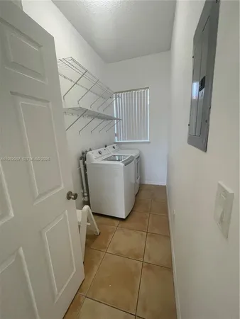 a room with a washer and dryer
