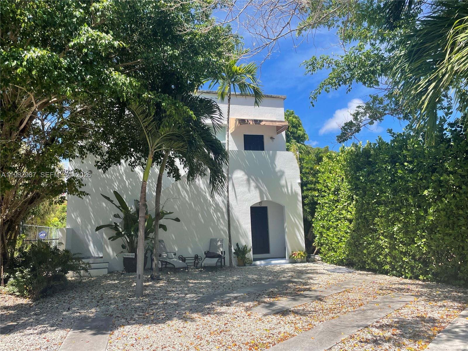 3421 Southwest 25th Street, Unit 1 Miami, FL 33133 - Photo 2 of 41 a view of a house with a tree