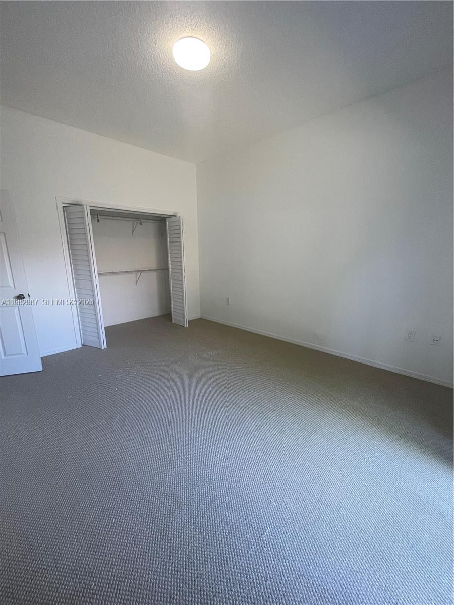 3421 Southwest 25th Street, Unit 1 Miami, FL 33133 - Photo 31 of 41 an empty room with a empty space
