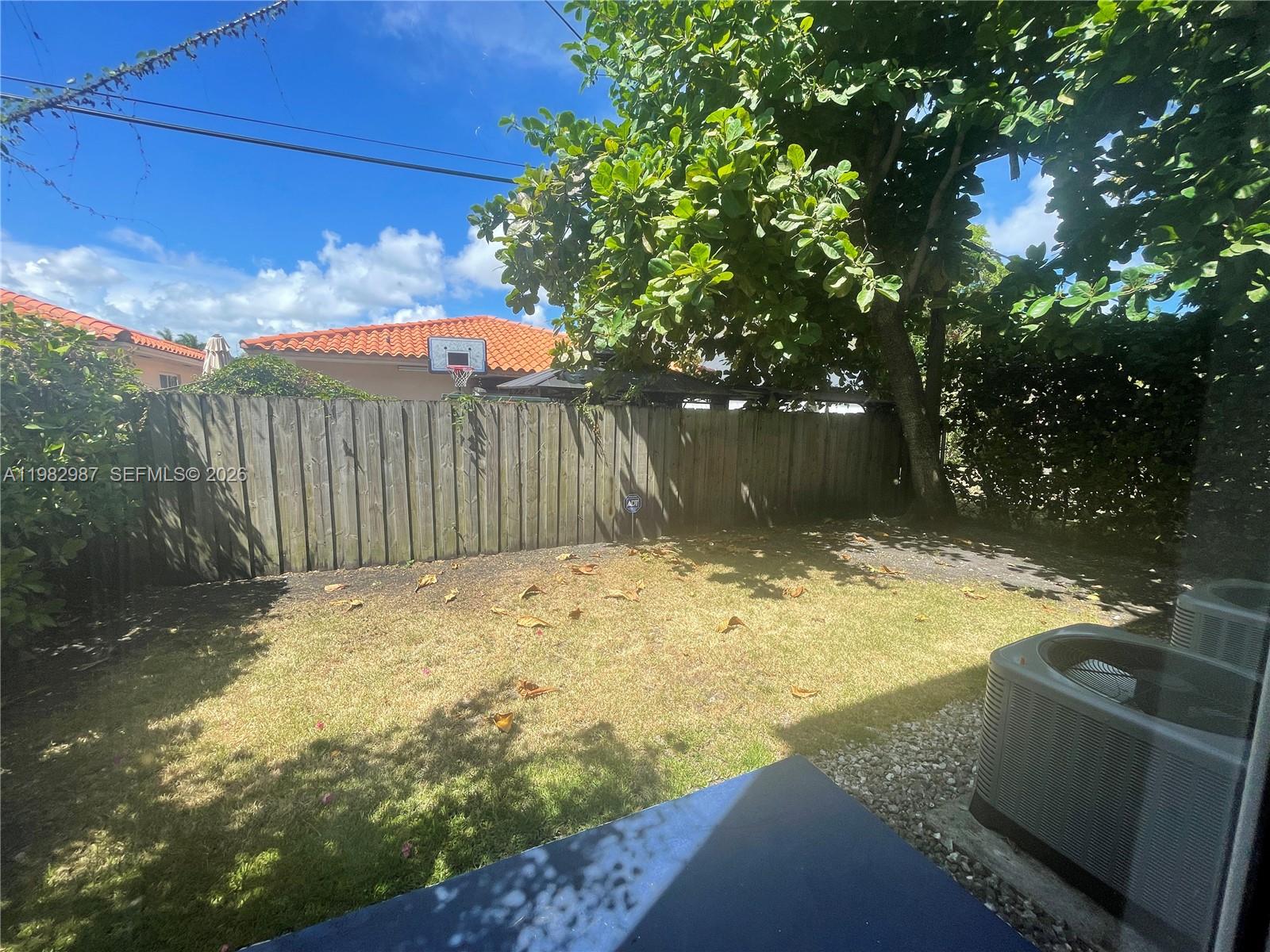 3421 Southwest 25th Street, Unit 1 Miami, FL 33133 - Photo 35 of 41 a view of a backyard of the house