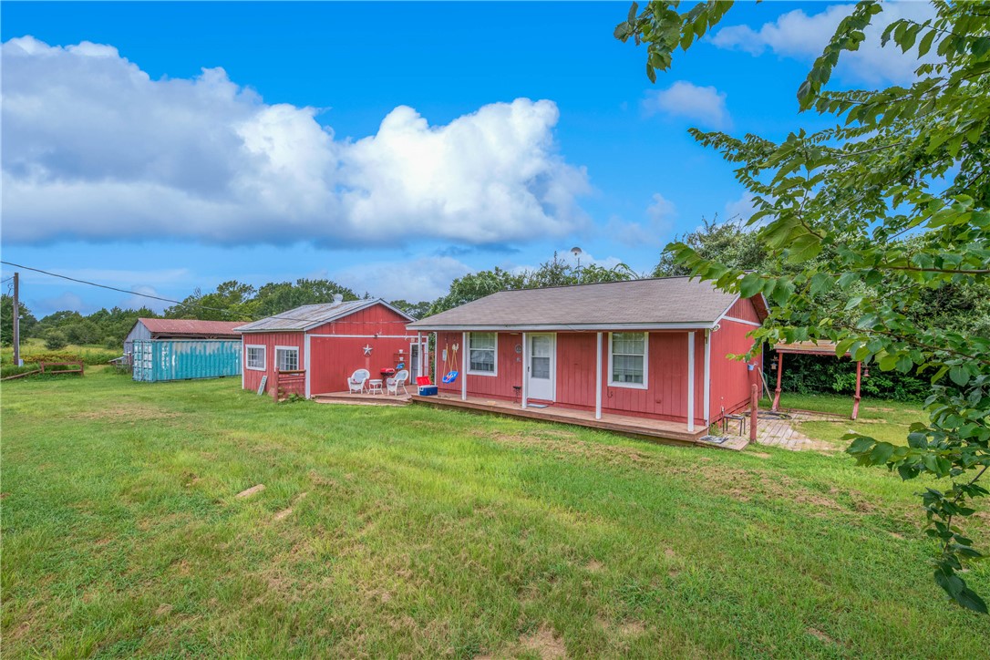 14452 Old Hearne Road Bryan, TX 77807 - Photo 3 of 17 a view of a yard in front of a house with a yard