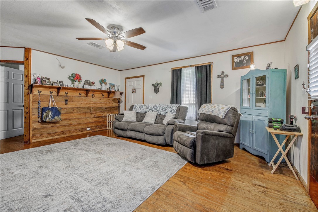 14452 Old Hearne Road Bryan, TX 77807 - Photo 4 of 17 a living room with furniture and a flat screen tv
