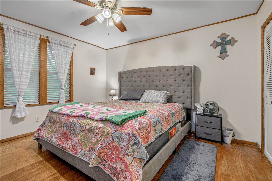 14452 Old Hearne Road Bryan, TX 77807 - Photo 9 of 17 a bedroom with a bed and window