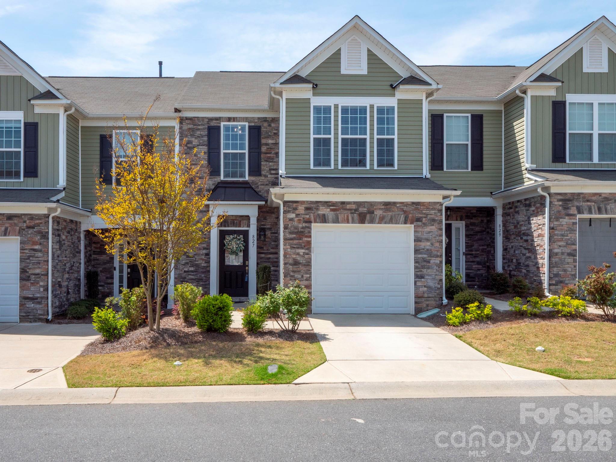 827 Canoe Song Road Fort Mill, SC 29708 - Photo 1 of 33 a front view of a house with yard