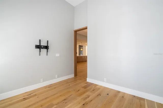 a kitchen with a refrigerator and a stove