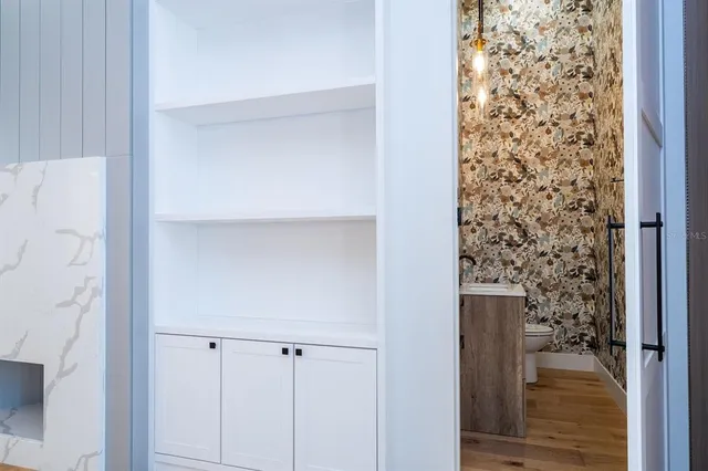 a bathroom with a glass door