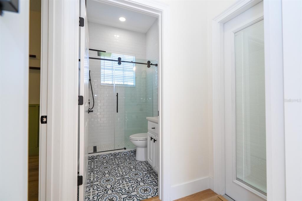 11213 Camden Park Drive Windermere, FL 34786 - Photo 43 of 99 a bathroom with a shower and a toilet