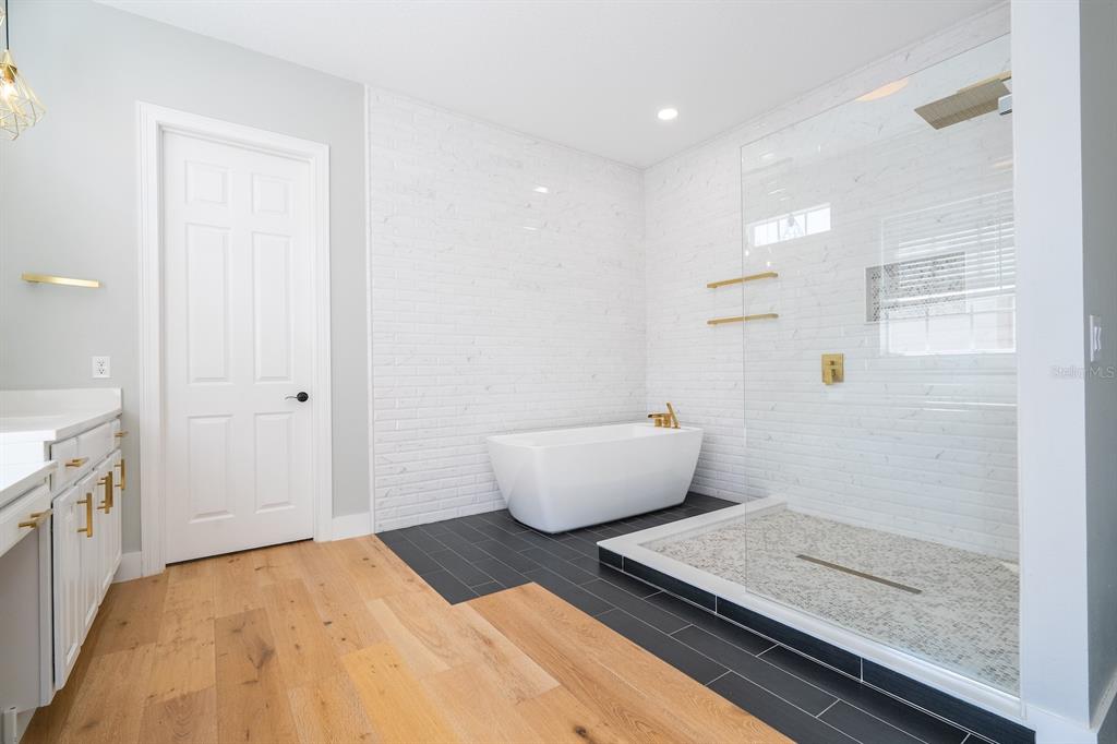 11213 Camden Park Drive Windermere, FL 34786 - Photo 67 of 99 a bathroom with a sink and a mirror