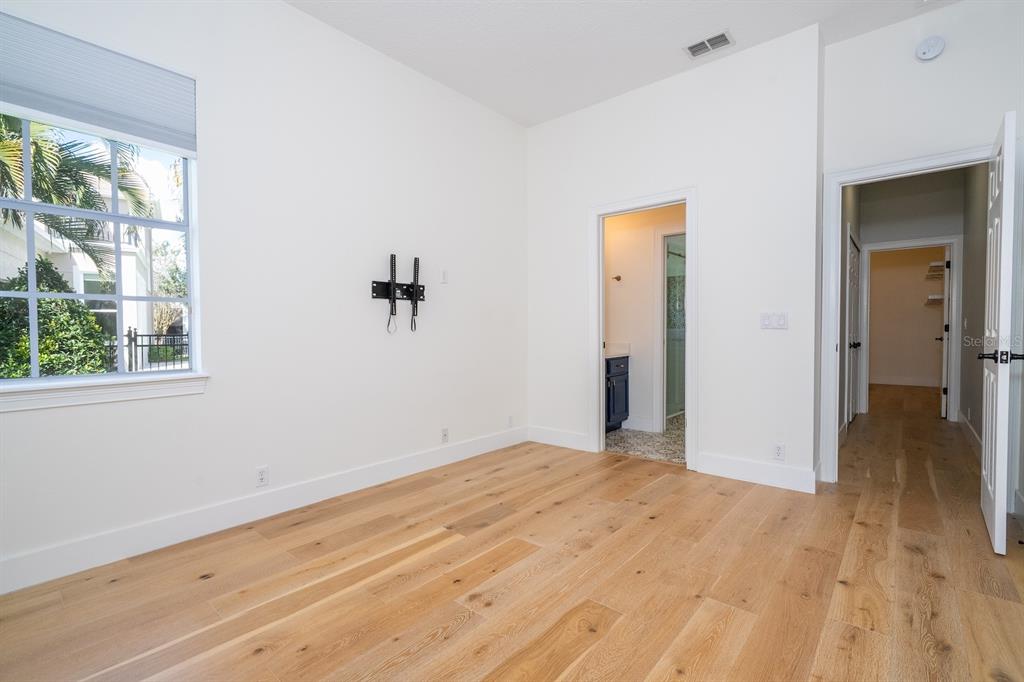 11213 Camden Park Drive Windermere, FL 34786 - Photo 80 of 99 a view of a room with wooden floor and a window