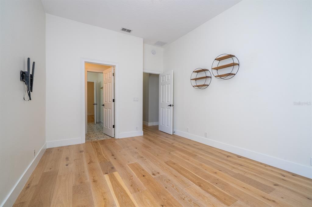 11213 Camden Park Drive Windermere, FL 34786 - Photo 81 of 99 a view of empty room with wooden floor