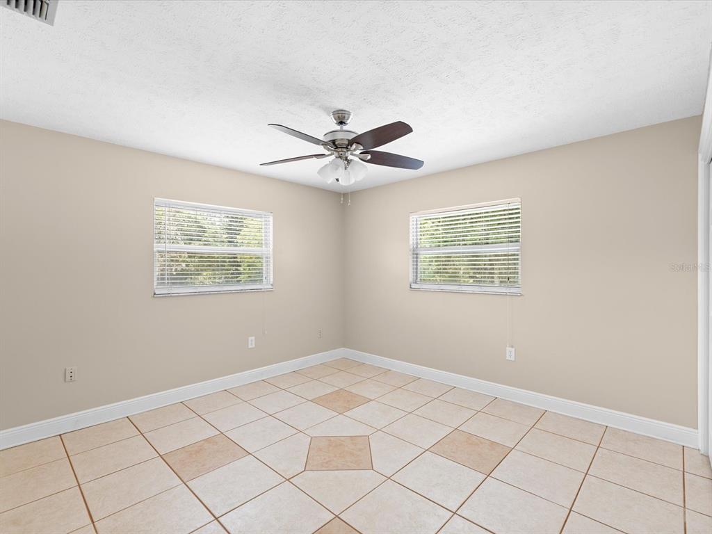 5904 Springrun Court Holiday, FL 34690 - Photo 36 of 53 a view of an empty room with a window