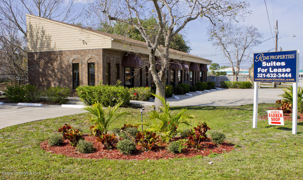 1707 Elm Street, Unit D Rockledge, FL 32955 - Photo 2 of 4 a view of a house with a yard and garden