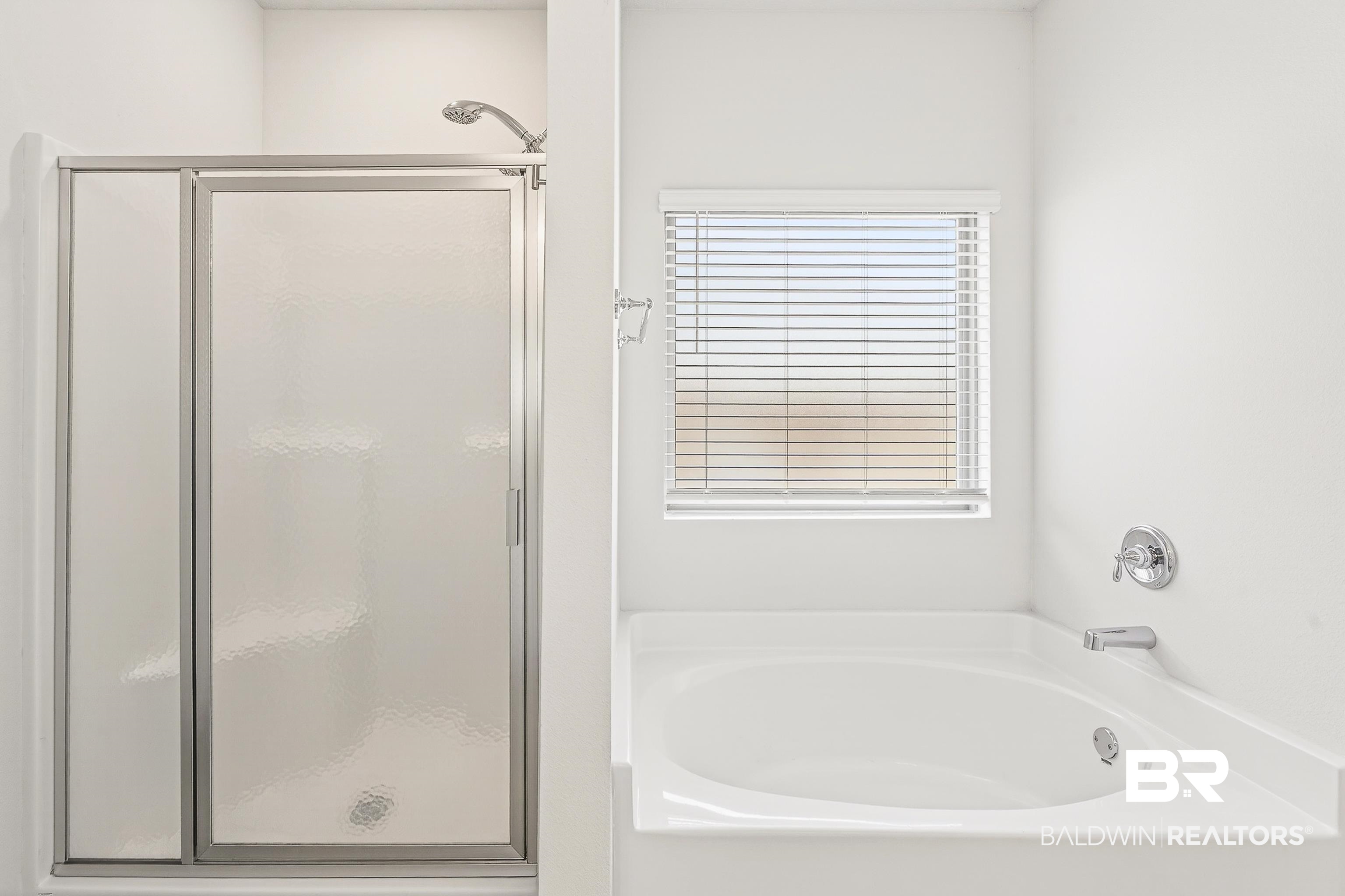 1728 Partridge Street Foley, AL 36535 - Photo 20 of 37 Full bath featuring a bath and a shower stall