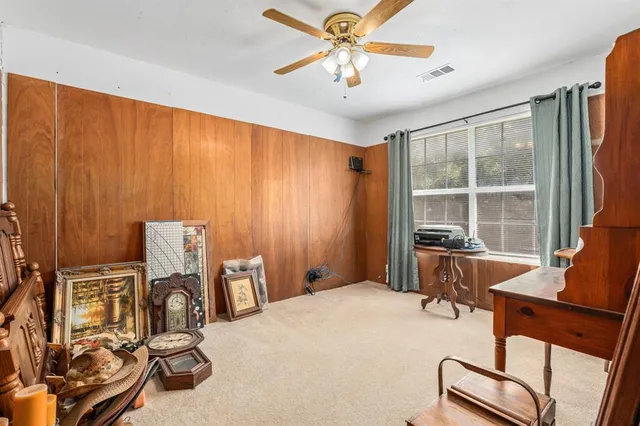 a workspace with furniture and window