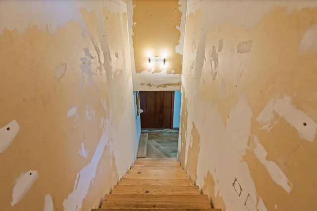 a view of a bathroom from a hallway