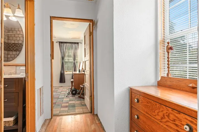 a view of a livingroom with furniture and windows