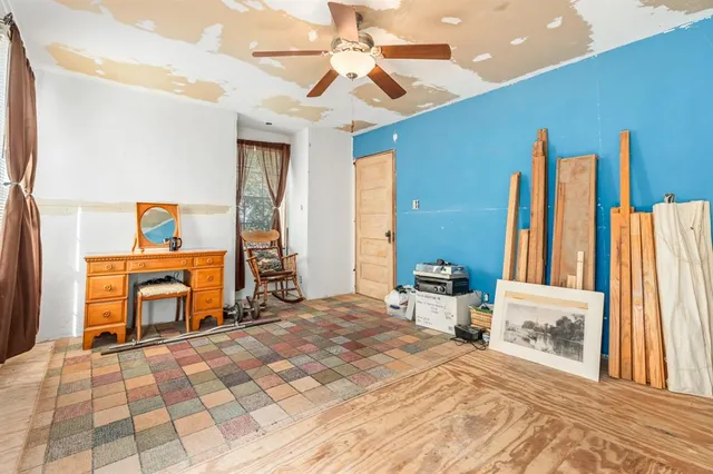 a bathroom with a sink mirror vanity and toilet