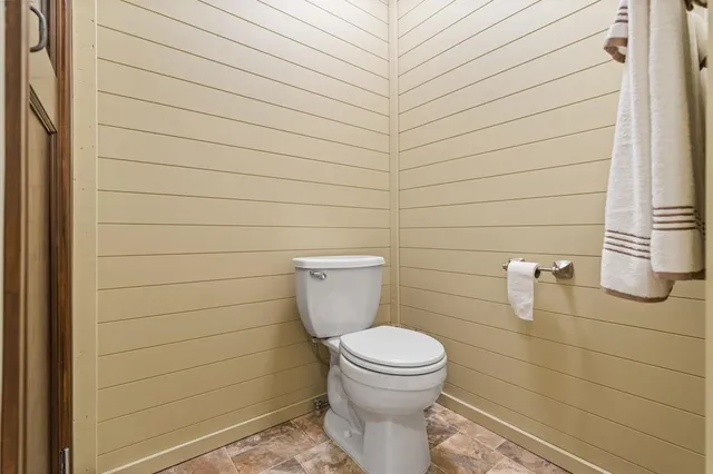 a bathroom with a bathtub and shower