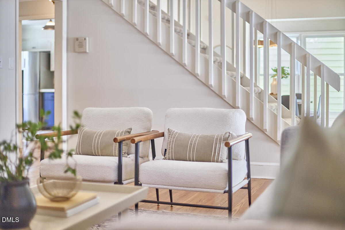 1918 Peppertree Street Durham, NC 27705 - Photo 13 of 45 a living room with furniture and a table