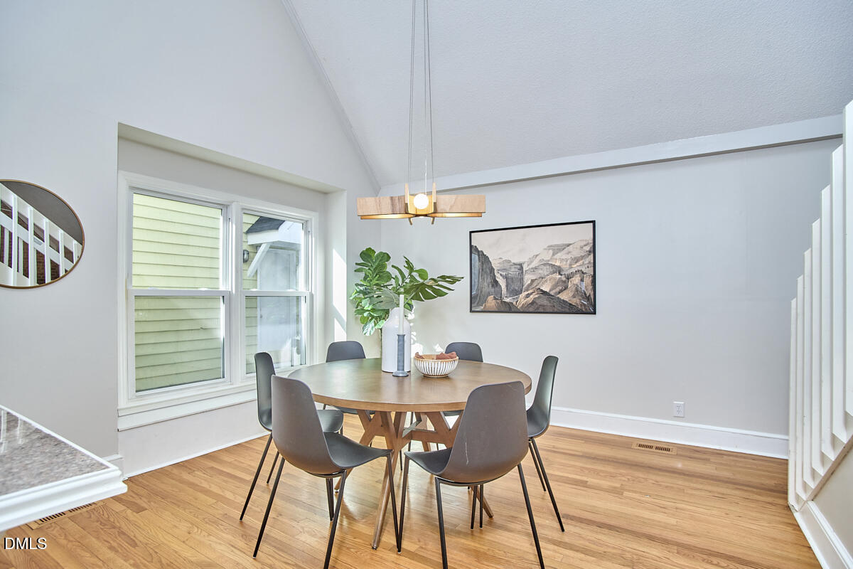 1918 Peppertree Street Durham, NC 27705 - Photo 20 of 45 a dining room with furniture and window