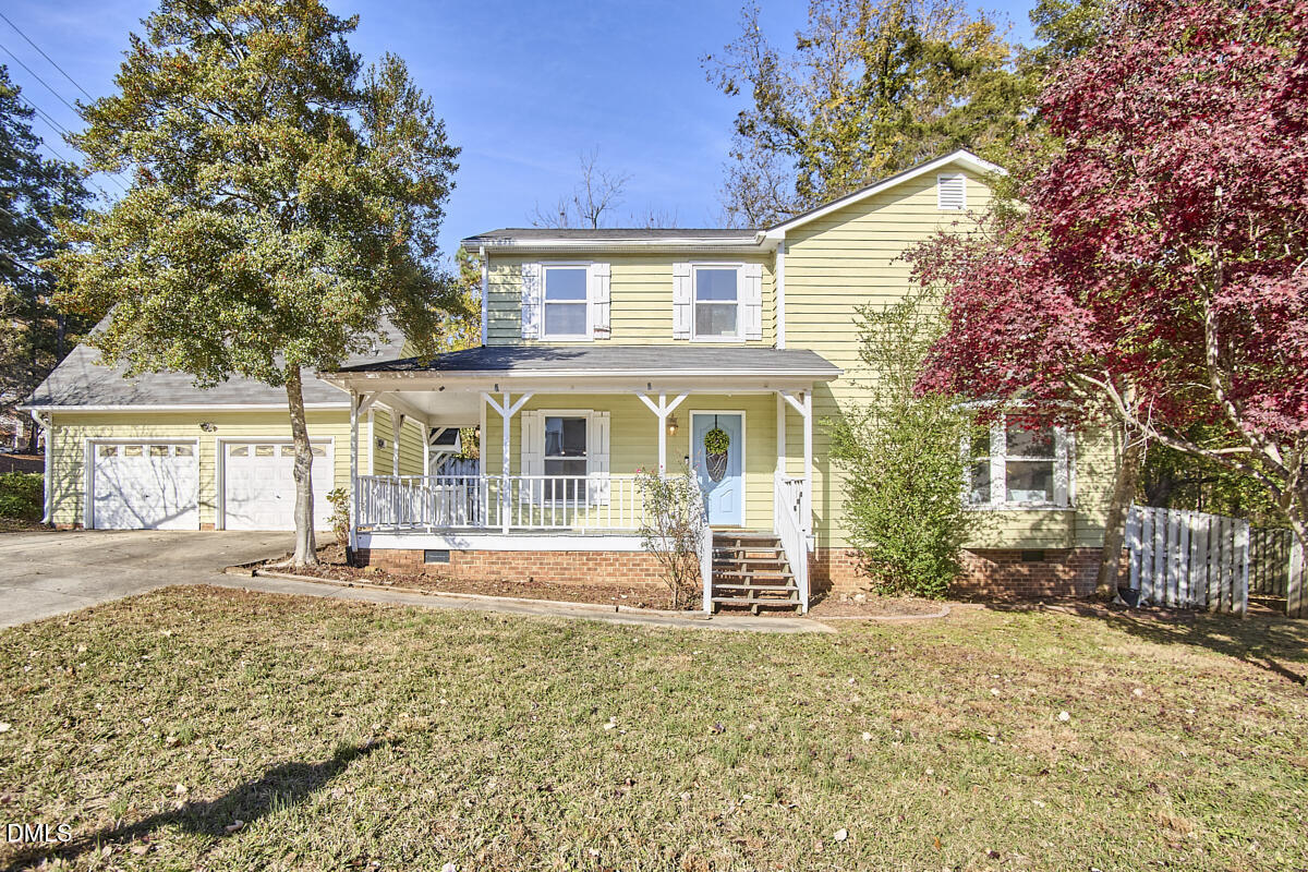 1918 Peppertree Street Durham, NC 27705 - Photo 2 of 45 a front view of a house with a yard