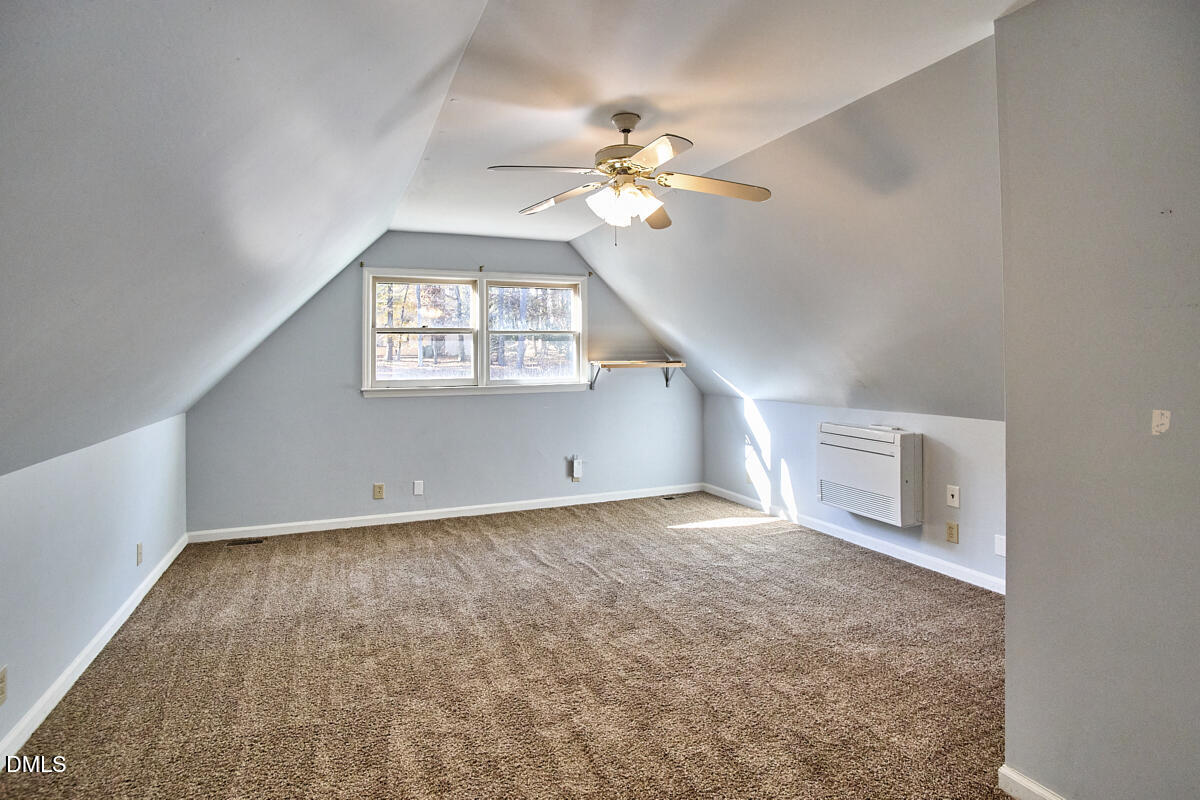 1918 Peppertree Street Durham, NC 27705 - Photo 33 of 45 a view of an empty room with a window