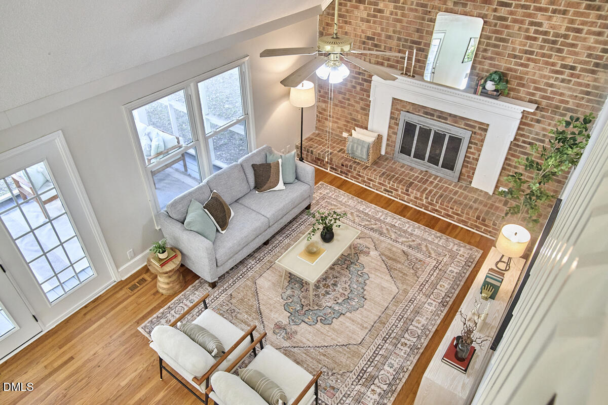 1918 Peppertree Street Durham, NC 27705 - Photo 37 of 45 a living room with furniture and a rug