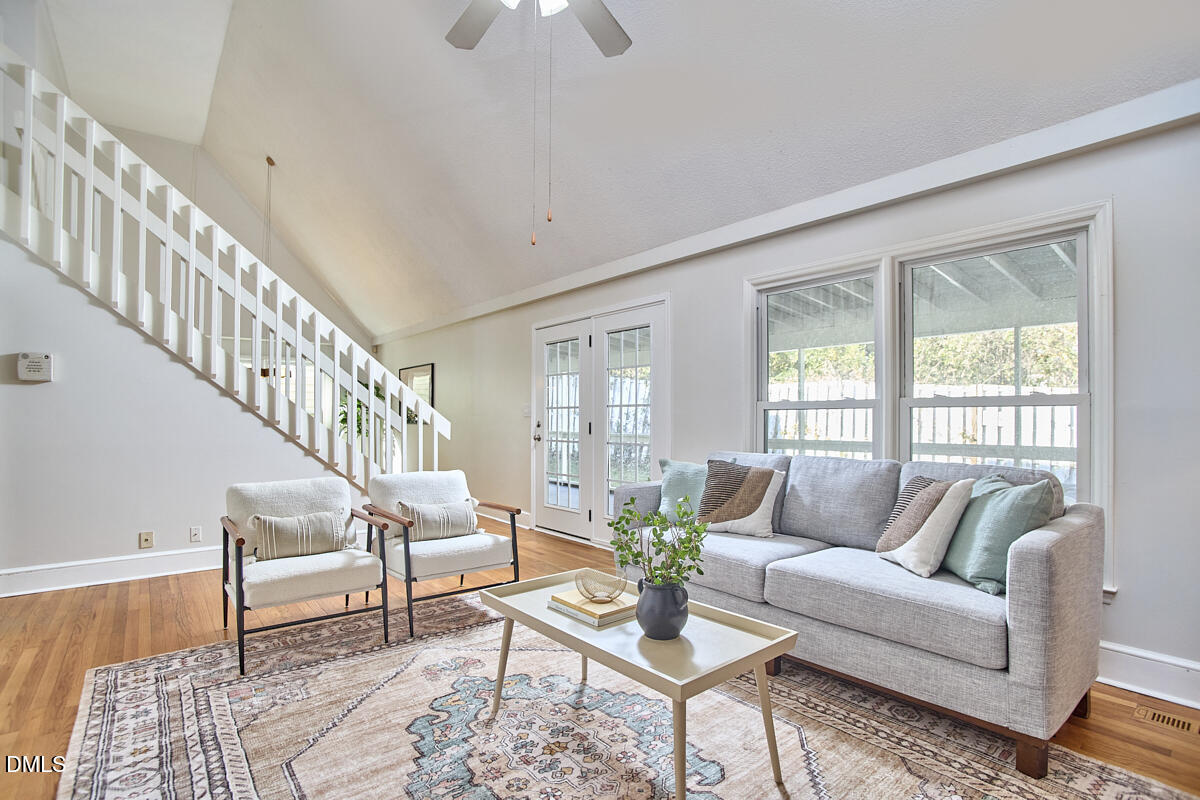 1918 Peppertree Street Durham, NC 27705 - Photo 9 of 45 a living room with furniture and wooden floor