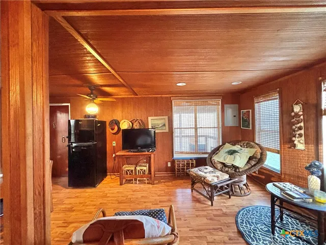 a outdoor space with lots of tables and chairs