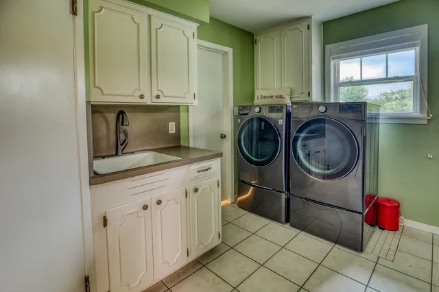 a utility room with dryer and washer