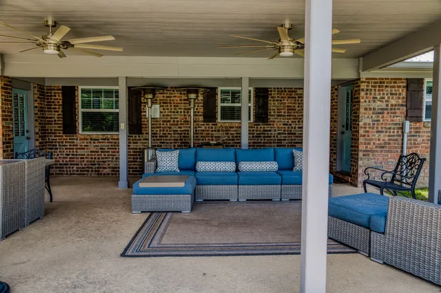 a view of a bench in the patio
