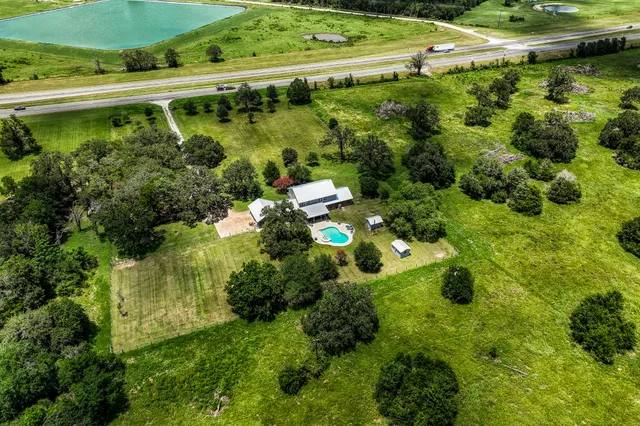 a view of a garden with a lake