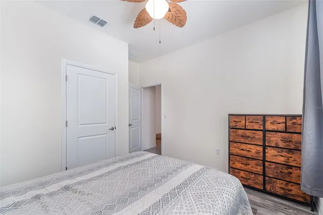 a view of a garage with a bike and car