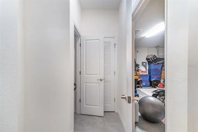 a view of a house with a backyard and a garden