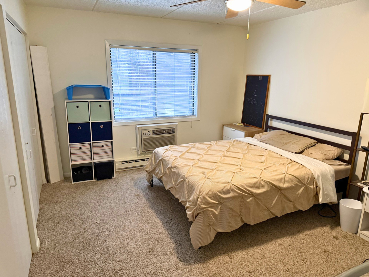 942 North Rohlwing Road, Unit GF Addison, IL 60101 - Photo 6 of 8 a bedroom with a bed and a window