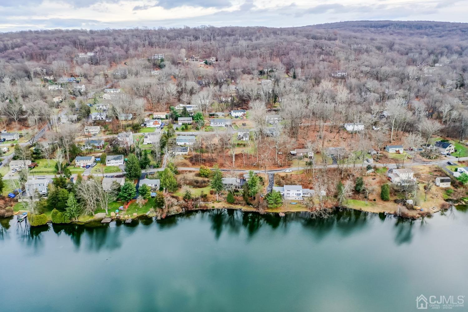 43 Shore Road Andover, NJ 07821 - Photo 15 of 25 an aerial view of residential houses with outdoor space and lake view
