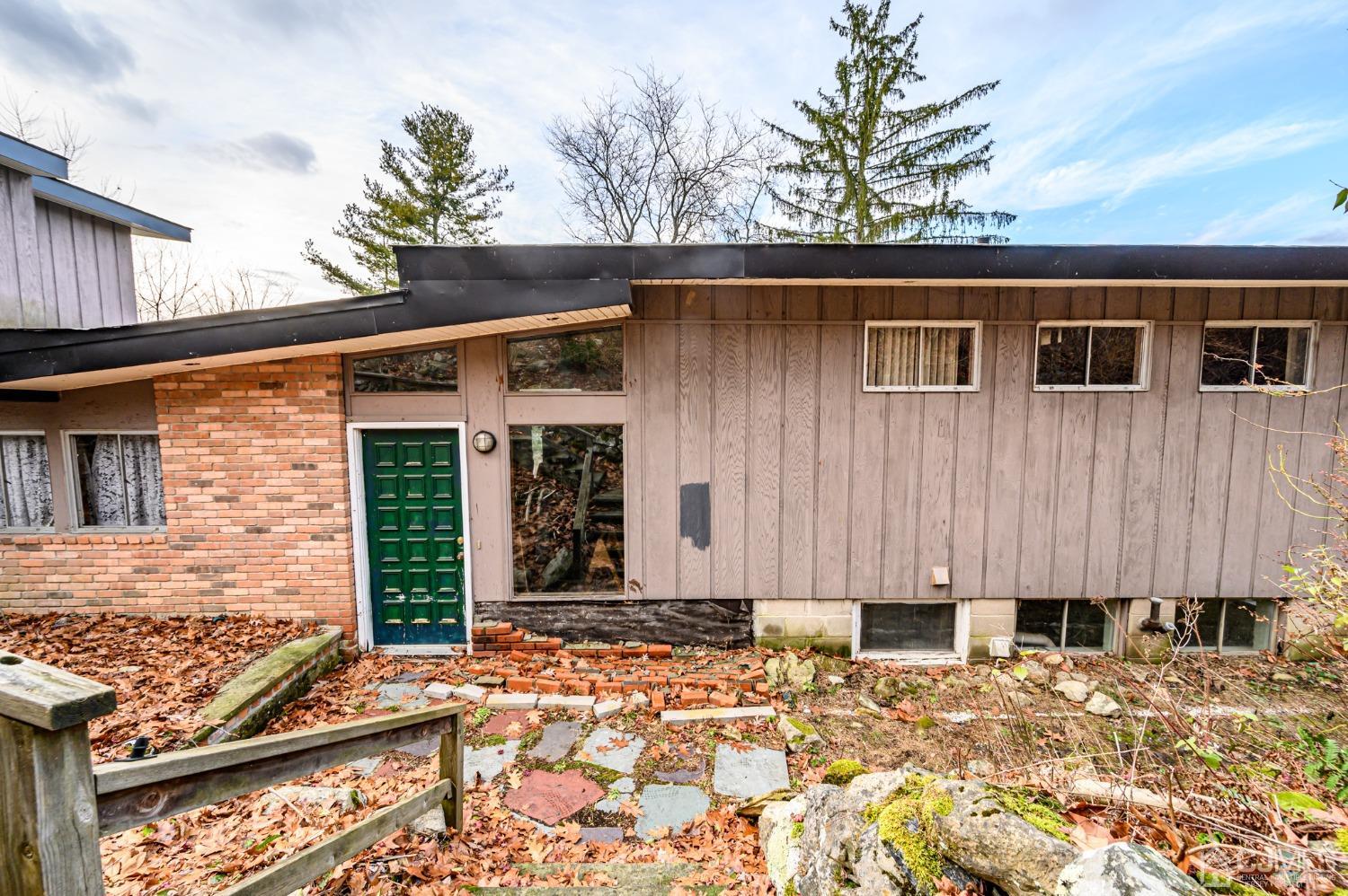 43 Shore Road Andover, NJ 07821 - Photo 2 of 25 a front view of a house with a yard