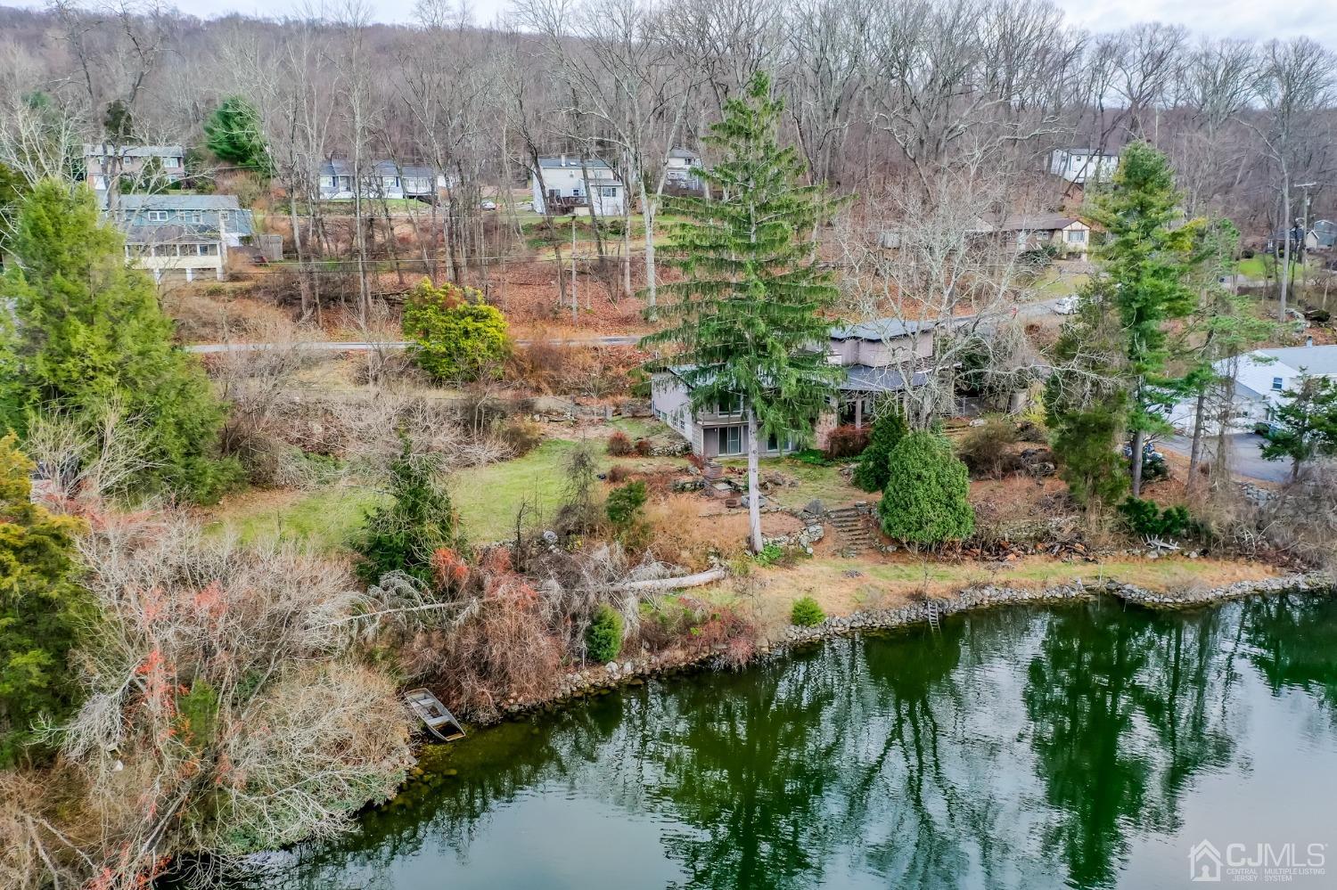 43 Shore Road Andover, NJ 07821 - Photo 21 of 25 a view of a lake with outdoor space