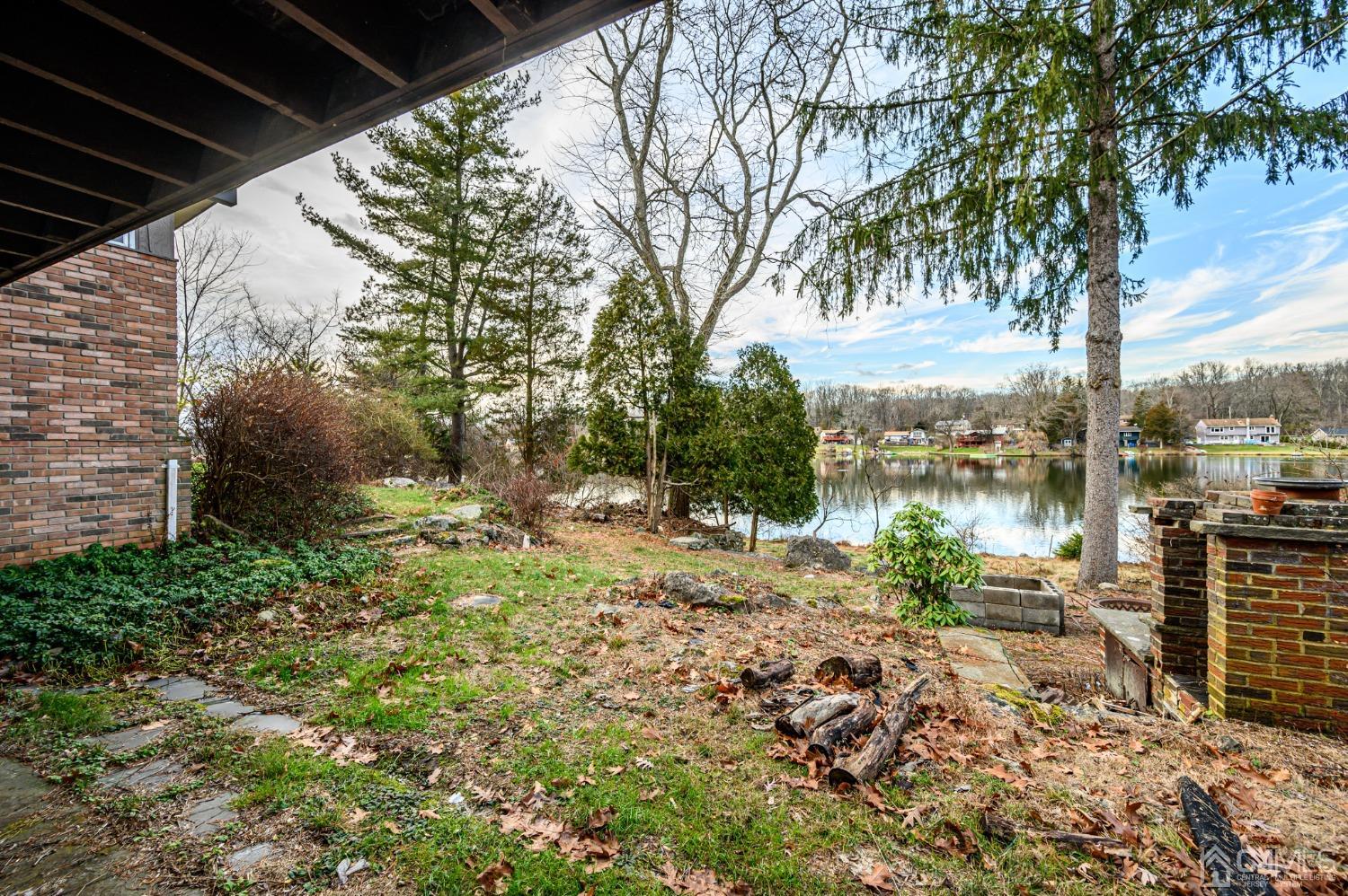 43 Shore Road Andover, NJ 07821 - Photo 3 of 25 a view of backyard with green space