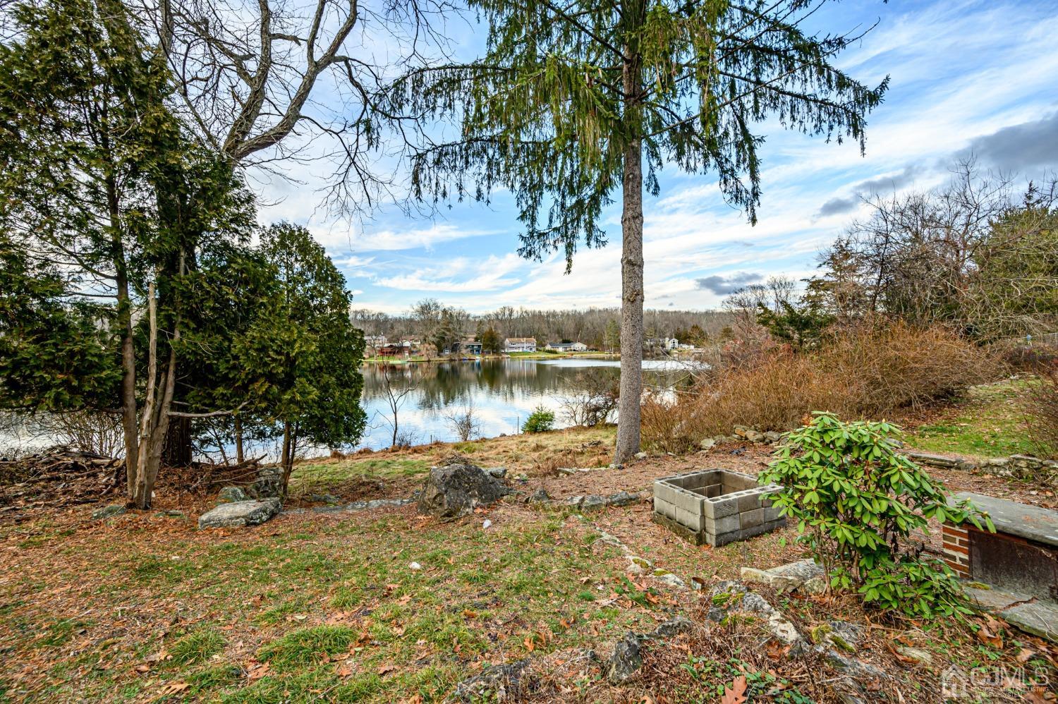 43 Shore Road Andover, NJ 07821 - Photo 4 of 25 a view of lake with a tree